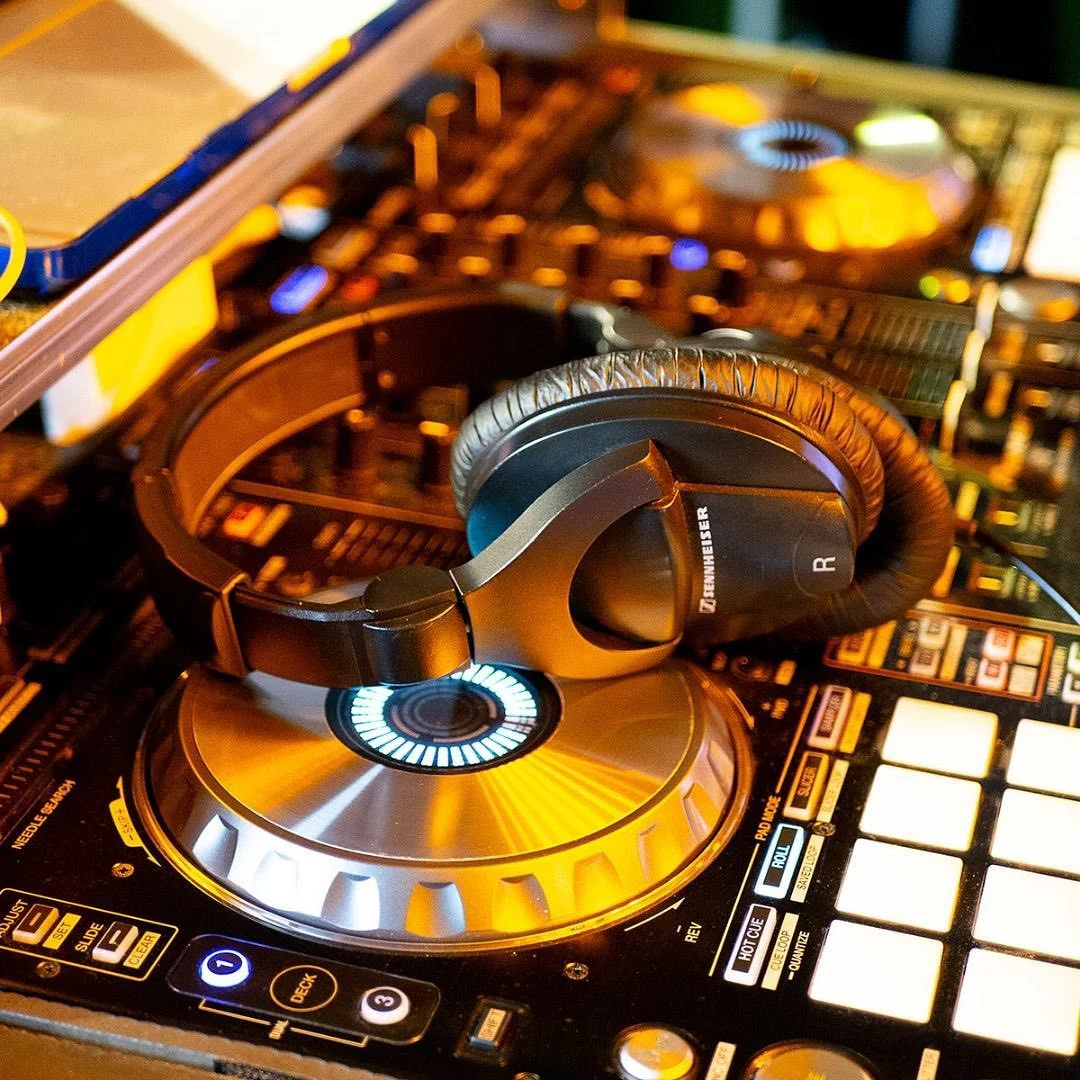 DJ booth set-up and lighting for corporate event