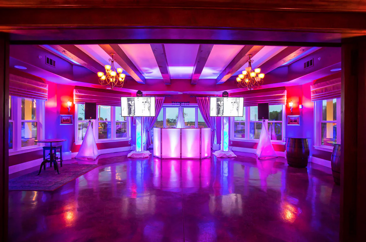 DJ booth multicolored lighting for dance floor