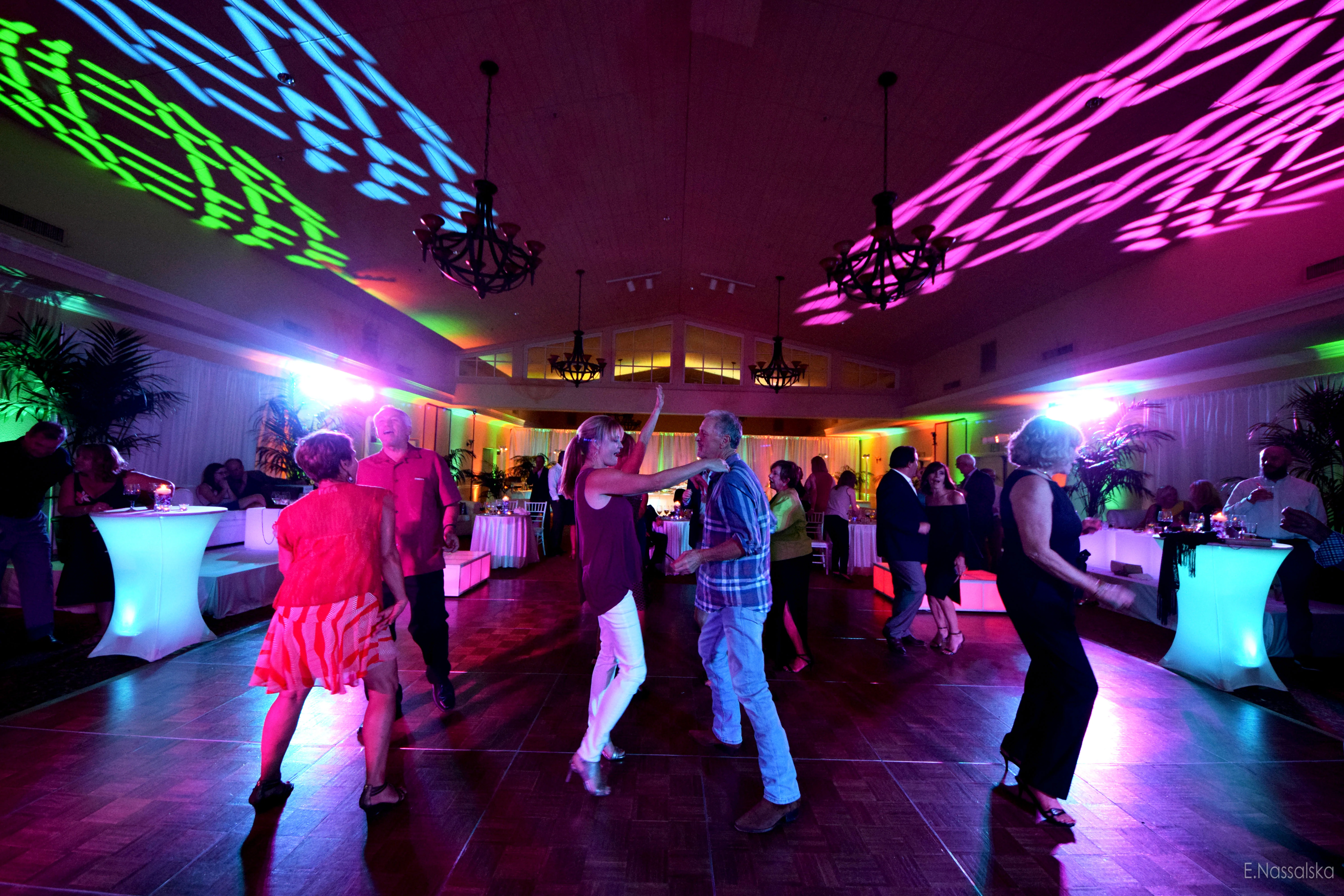 Dance floor multicolored lighting and ceiling pattern wash
