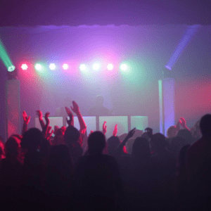 Concert stage lighting and DJ booth multicolored lighting.