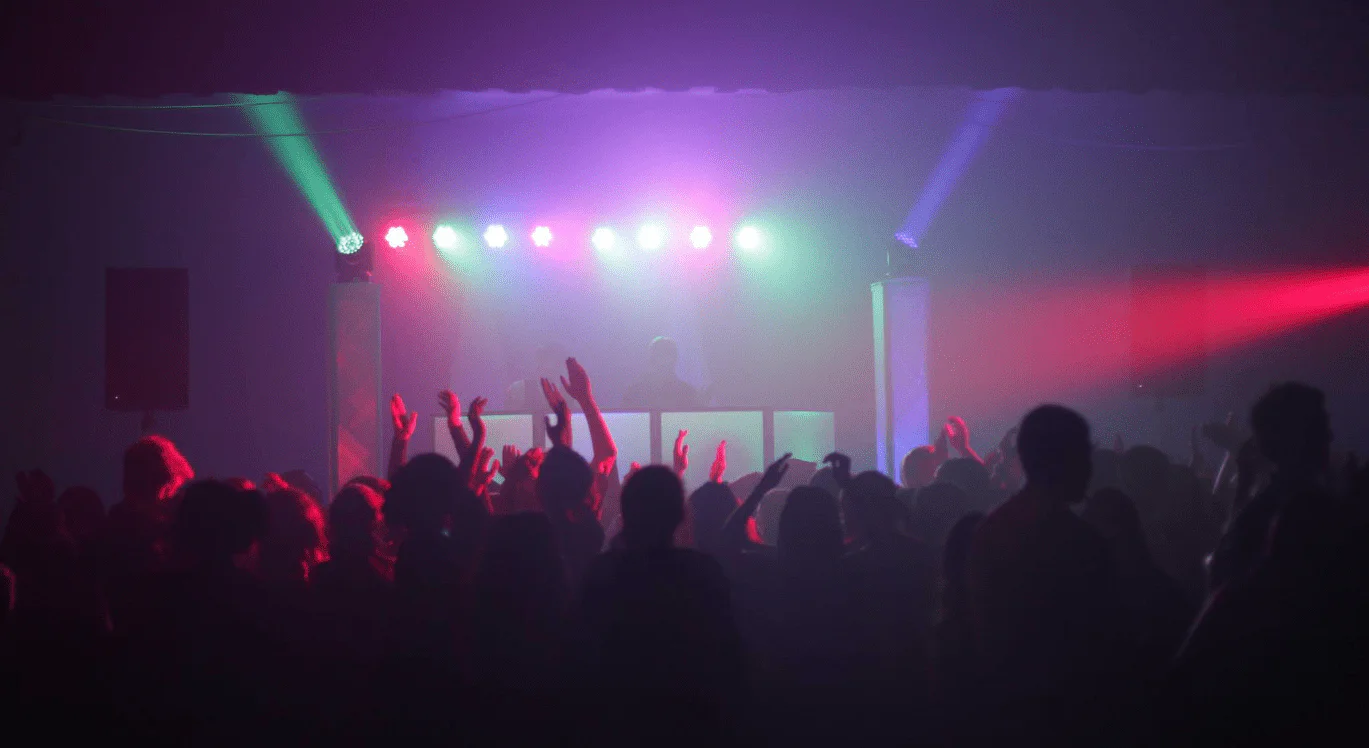 Concert stage lighting and DJ booth multicolored lighting.