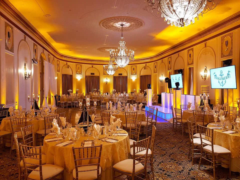 Chandelier and up lighting for indoor dining event